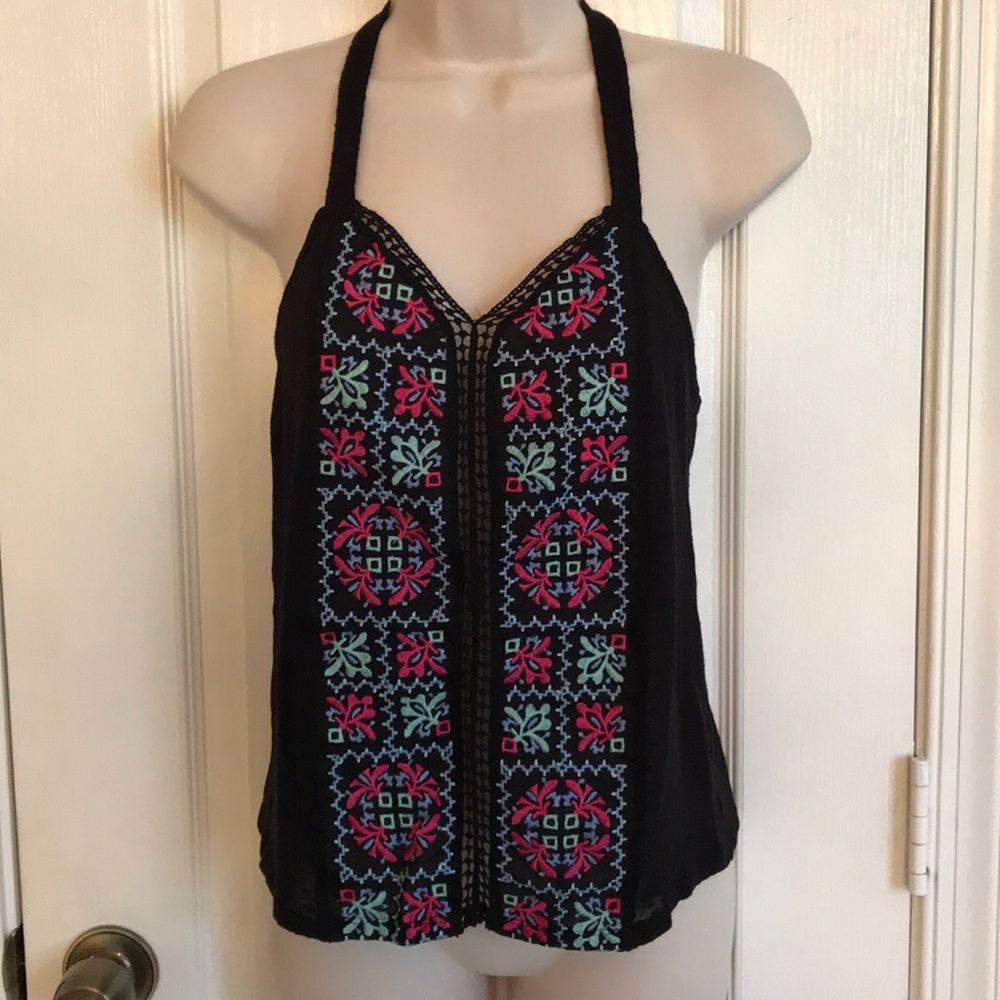 Top with cute embroidery and crochet back